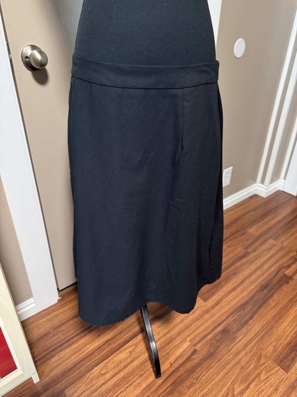 Elegant Black Midi Skirt with Slight A-Line Silhouette